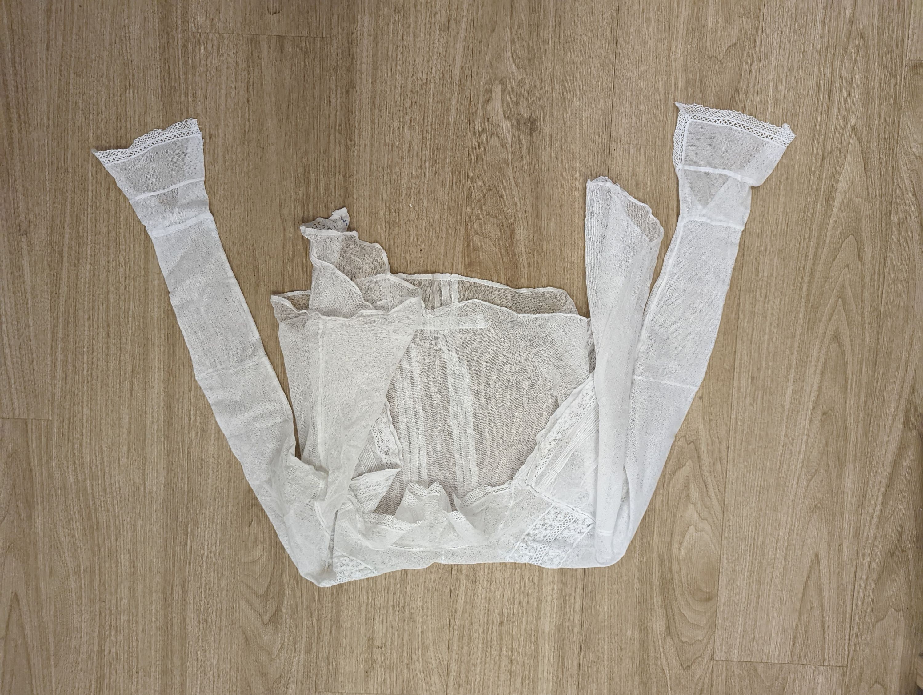 A lace jacket and five fine net and lace Edwardian ladies blouses.